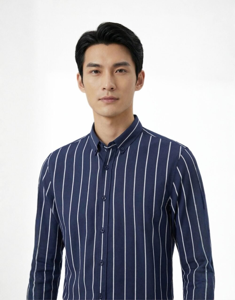 Slim-fit striped shirt with tailored trousers in a clean, modern smart-casual silhouette