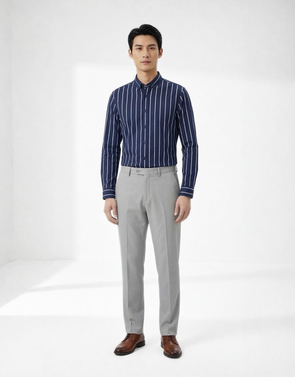 Slim-fit striped shirt with tailored trousers in a clean, modern smart-casual silhouette